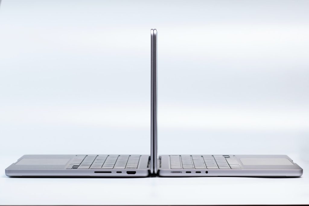 which macbook should I buy - silver laptop with a black keyboard